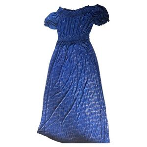 It’s a blue and gold dress, a long dress, that you can use anywhere.